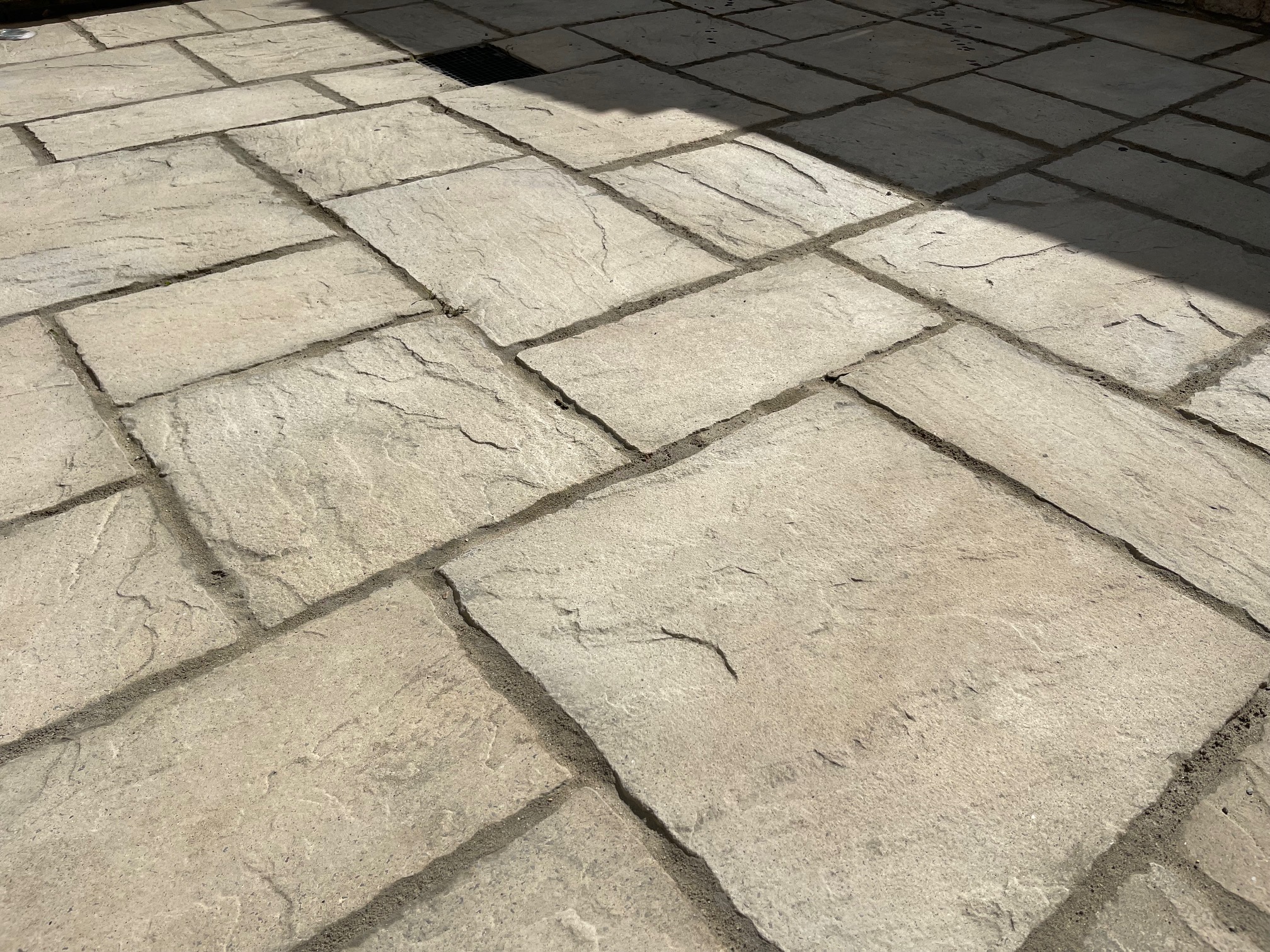 Newly laid natural sandstone flagstone paving